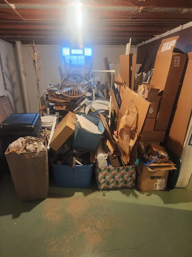 Roll-off dumpster container at job site for 2 Yard Dumpster Rental in Anchorage